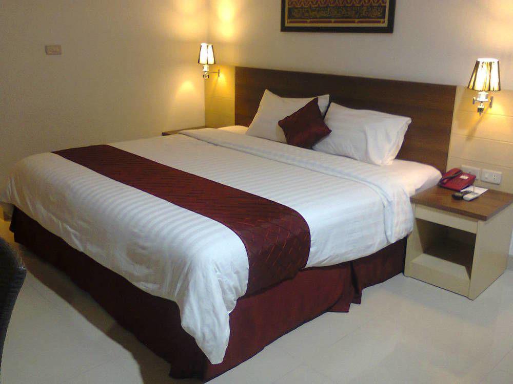 Hotel Bandara Syariah Negarasaka Bagian luar foto